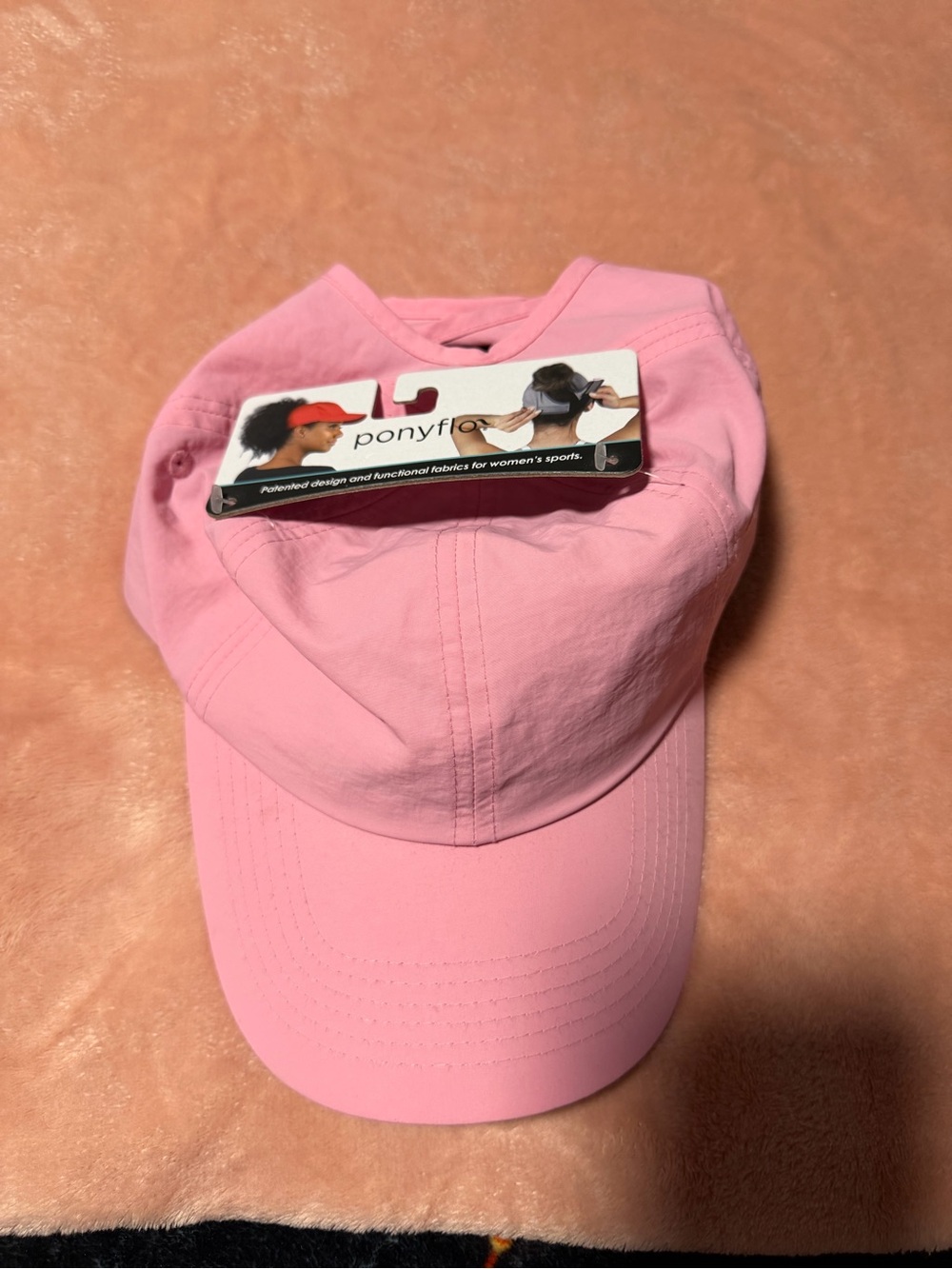Ponyflo womens Light Pink Ponytail Baseball Cap
